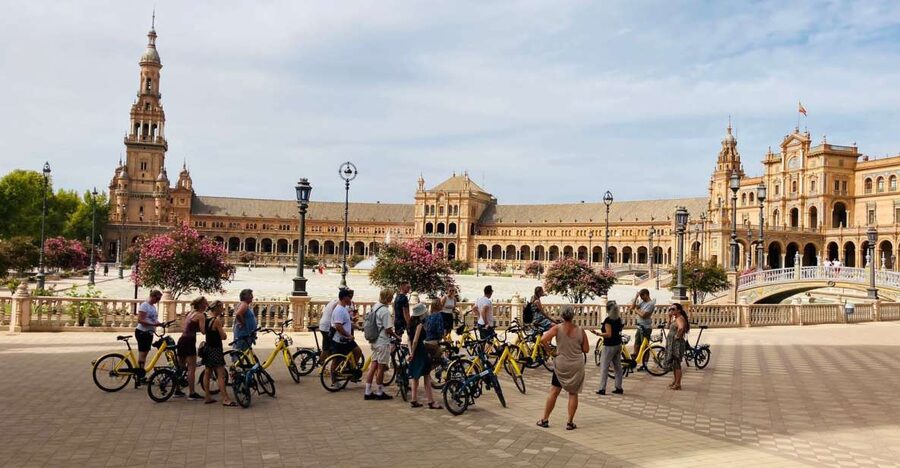 Seville: Relaxing City Bike Tour with a Tour Guide - Orange trees and open paths in the Jardines de Murillo