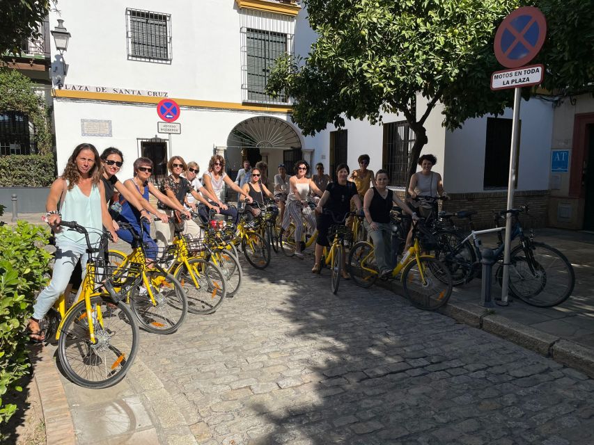 Seville: Relaxing City Bike Tour with a Tour Guide - María Luisa Park and the tilework of Plaza de España