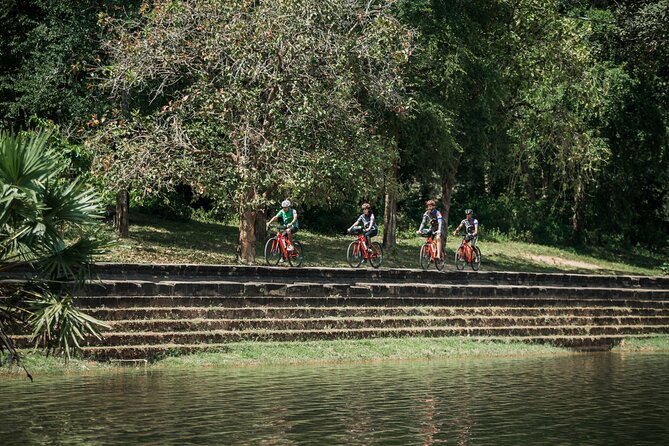 Siem Reap: Angkor Wat Sunrise Bike Tour & Jungle Breakfast - Riding through Angkor’s quieter forest paths
