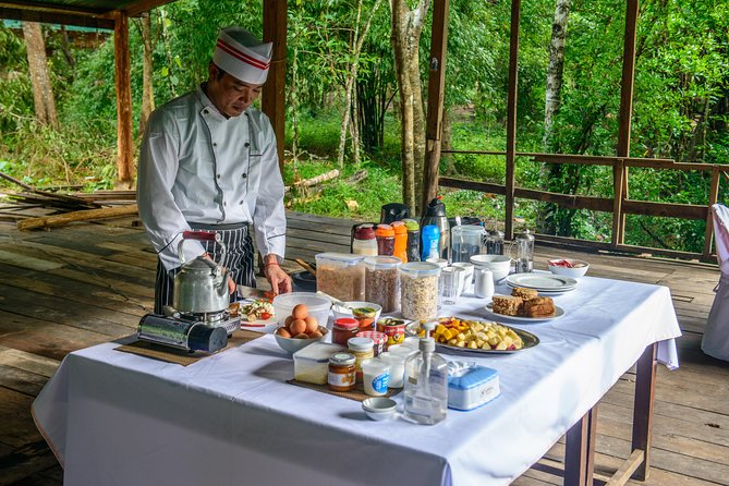 Siem Reap: Angkor Wat Sunrise Bike Tour & Jungle Breakfast - Bayon and the stone faces of Angkor Thom