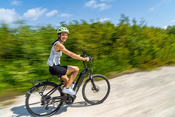 Small Group E-Bike Grand Cayman Ecological Half-Day Tour - Conch Point Road and the local side of West Bay