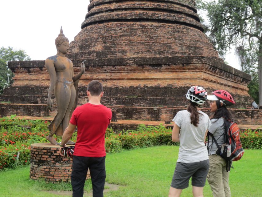 Sukhothai: Historical Park & Countryside Cycling Tour - Entering Sukhothai Historical Park by bicycle