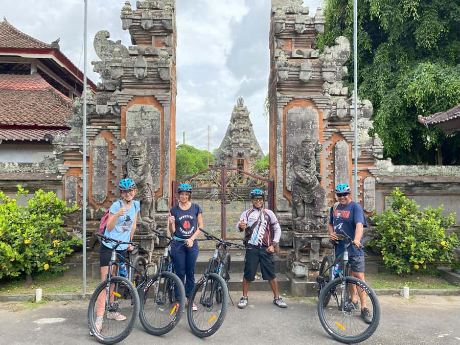 Ubud: Downhill Bike Tour with Rice Fields, Volcano and Meal - Village temples and Balinese traditions