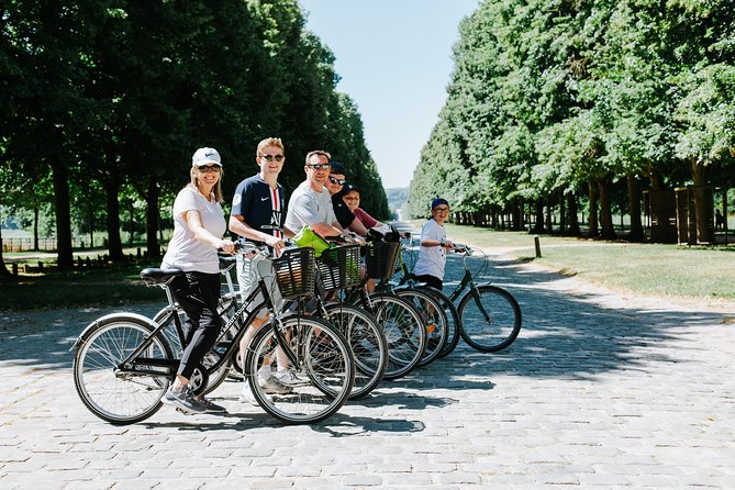 Versailles Domain Bike Tour with Palace Entry by Train from Paris - Starting in the Marais and riding the train